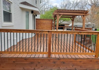 Newly stained deck and patio in Grimes, Iowa
