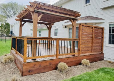 Fresh deck and pergola staining job in Des Moines, Iowa